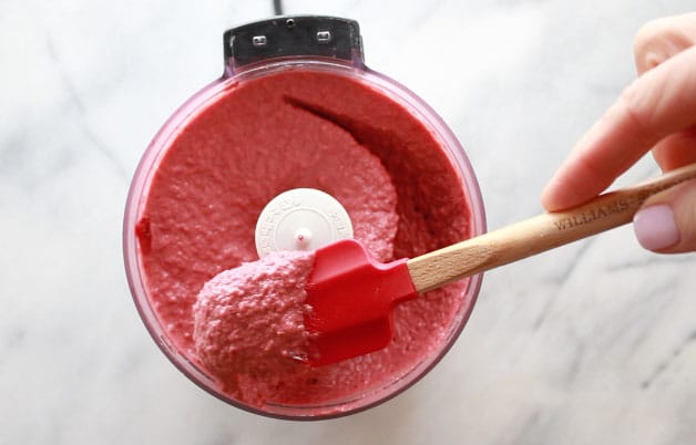 red beet hummus in a small food processor