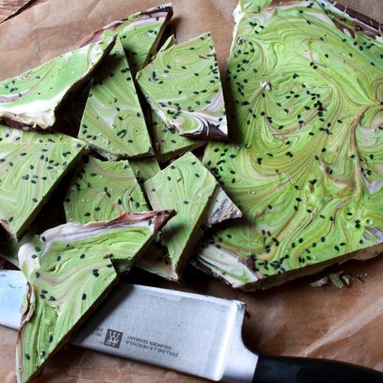 vibrant green matcha holiday bark with sesame s