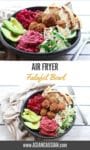 falafel balls in a bowl with beet hummus, slaw, red onions, and avocado on a white board and fork