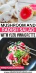 A vibrant mushroom and radish salad in a black bowl with sprouts on top and silver chopsticks on the side