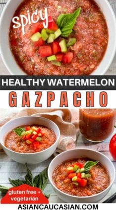 Three white bowls filled with spicy watermelon gazpacho on a white wooden board, with ingredients on the side: a tomato, basil, and basil.