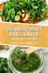 A clear glass jar of cilantro, mint, basil sauce with a small wooden spoon inserted, and bunch of fresh cilantro and basil leaves, and ginger root.